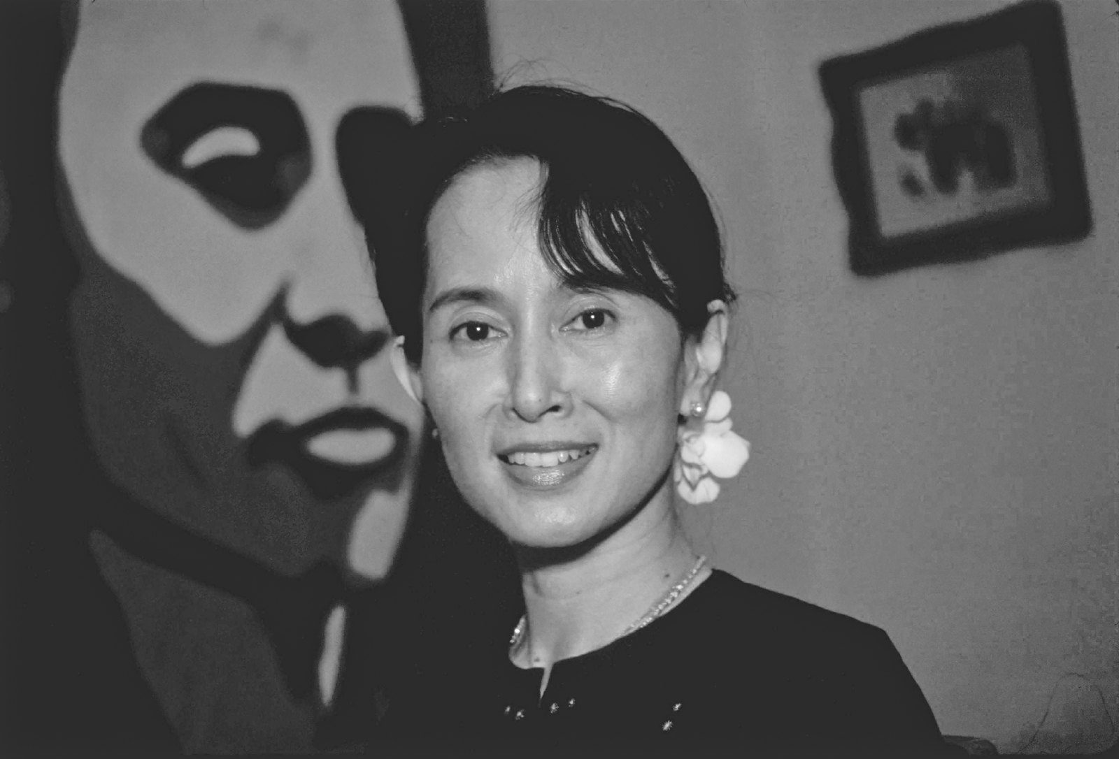 Portraits — media?path=galleries%2Fportraits%2F24 daw aung san suu kyi in front of portrait of her father bw